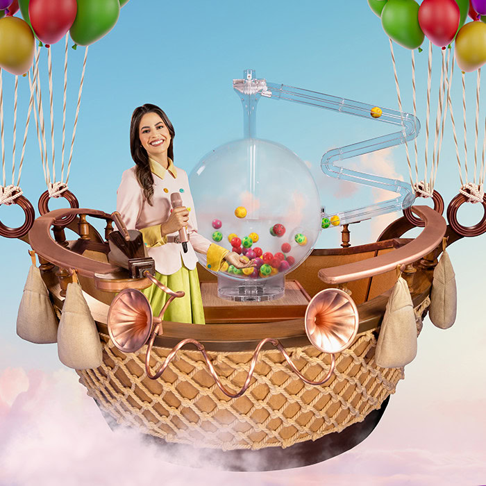 Balloon Race live bonusronde met gele paarse groene en rode luchtballonnen en ball drawing machine